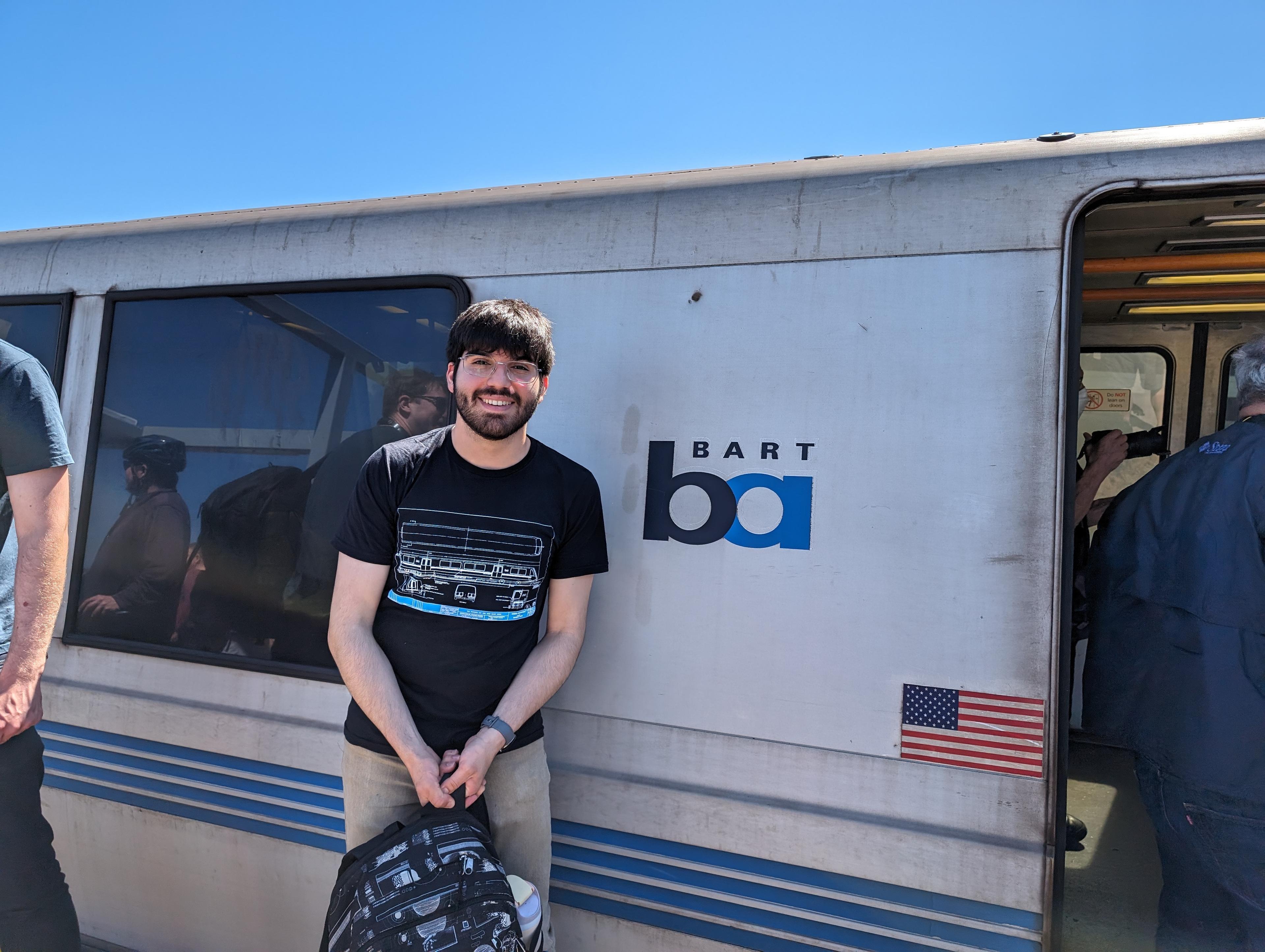 A picture of me next to a legacy bart car